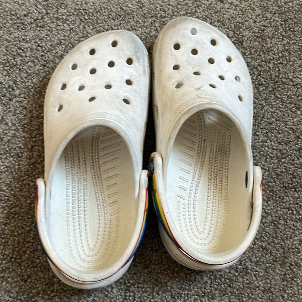 white and rainbow crocs